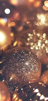 Elegant gold bokeh mobile wallpaper with shimmering lights.