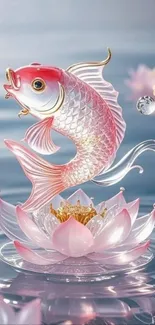 Goldfish sculpture on a blooming pink lotus in water.