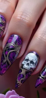 Gothic nail art with purple and skull design.