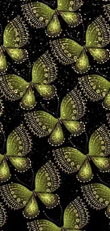 Intricate green butterfly pattern on a black background wallpaper.