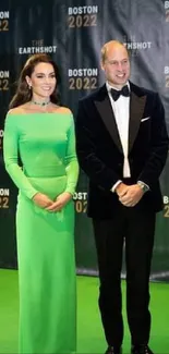 Elegant couple at green carpet event, Earthshot Prize 2022.