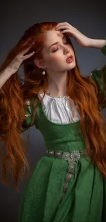 Woman with long red hair in a green dress on a black background wallpaper.