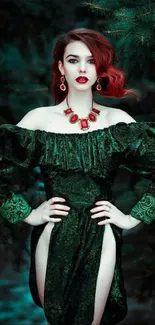 Elegant woman in a dark green dress with red accents standing in a forest.