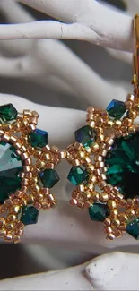 Elegant green gemstone earrings with gold beadwork