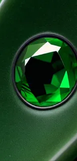 Emerald green gemstone on sleek surface