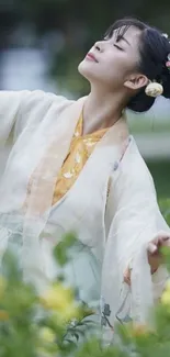 Elegant woman in Hanfu surrounded by nature.