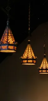 Vintage lanterns illuminate darkness with warm glow.