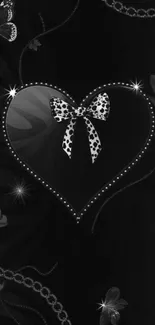 Black and white heart with butterflies and floral design wallpaper.