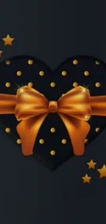 Black heart with golden bow and stars wallpaper.