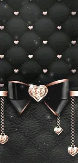 Elegant black wallpaper with bow and heart accents.