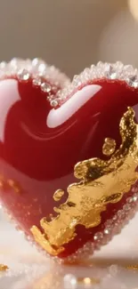Glossy red heart with gold and crystals.