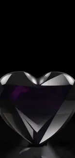 Elegant heart-shaped gemstone against a black background.