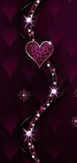Mobile wallpaper with a sparkling heart jewel on rich purple.