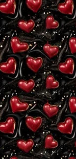 Red hearts pattern on black wallpaper.