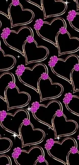 Elegant heart pattern wallpaper with gold and purple on black background.