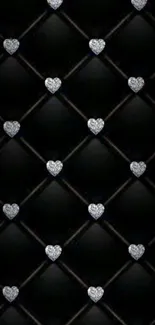 Luxurious black wallpaper with silver heart pattern.