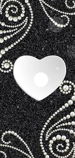 Elegant black wallpaper with pearls and heart design.