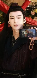 Historical figure holding a smartphone in elegant, detailed attire.