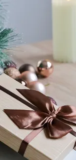 Elegant gift with brown ribbon and festive decor.