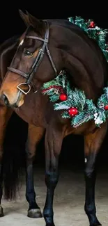 Majestic brown horse with a decorative Christmas wreath.