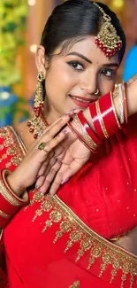 Elegant woman in traditional Indian red saree.