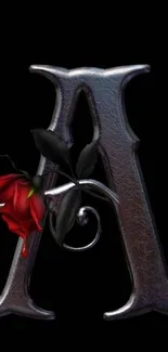 Metallic letter A with red rose on black background.