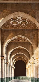 Elegant Islamic arches with intricate ceiling design in warm beige tones.