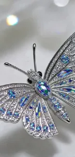 Jeweled butterfly mobile wallpaper with shimmering details.