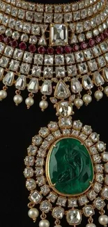 Luxurious necklace with emerald and diamonds on black background.