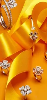 Elegant wallpaper with gold ribbons and diamond floral rings.