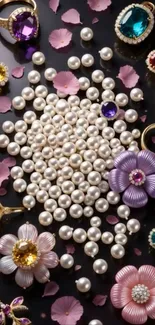 Jewels, pearls, and floral rings on black background