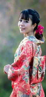 Japanese woman in red floral kimono with scenic background.