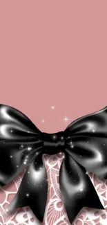 Elegant mobile wallpaper with black bow over pink lace.