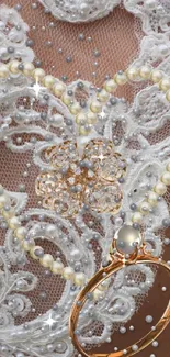 Elegant lace and pearl design with gold ring on wallpaper.