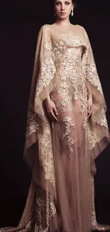 Elegant nude lace evening gown on dark background.