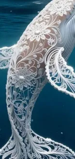 Lace designed whale in serene blue ocean.