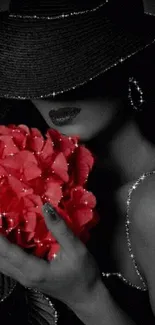 Mysterious lady with red flowers and black hat wallpaper.