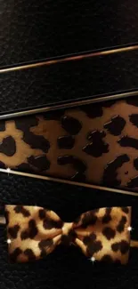 Elegant leopard print wallpaper with a stylish bow design. Perfect for a chic look.