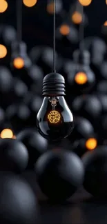 Glowing light bulb in dark background with bokeh effect.