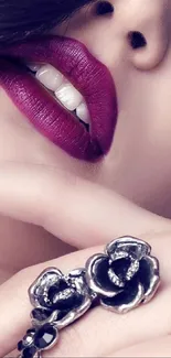 Close-up of alluring lips with silver rose rings.