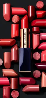 Assorted lipsticks arranged on a black background