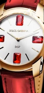 Luxury watch with gold and red accents