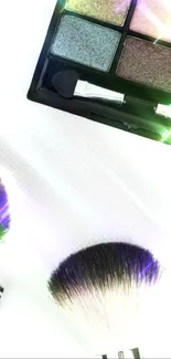 Elegant makeup brush set with colorful palette on white background.