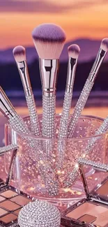 Elegant makeup brushes in a dazzling display with a sunset backdrop.