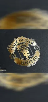 Gold Manchester United emblem on black background.