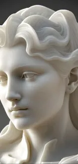 Elegant marble bust of a serene woman on a smartphone wallpaper.