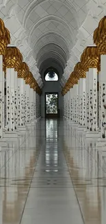 Elegant marble corridor with gold accents and symmetrical columns.