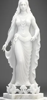 Elegant marble goddess statue on a gray background.