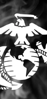 US Marine Corps emblem in black and white with smoke background.