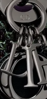 Elegant metallic charm with intricate details on textured background.